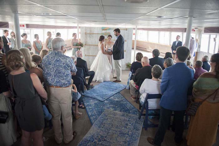 coastal portland maine wedding photographed by jordan moody for brea mcdonald photography casco bay boat wedding