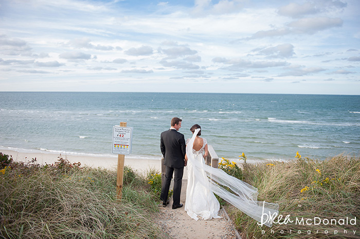 wedding at the westmoor club in nantucket massachusetts with wedding photographer brea mcdonald of brea mcdonald photography outdoor ceremony country club reception floral design by soiree floral beach portraits couple portraits new england coastal weddings